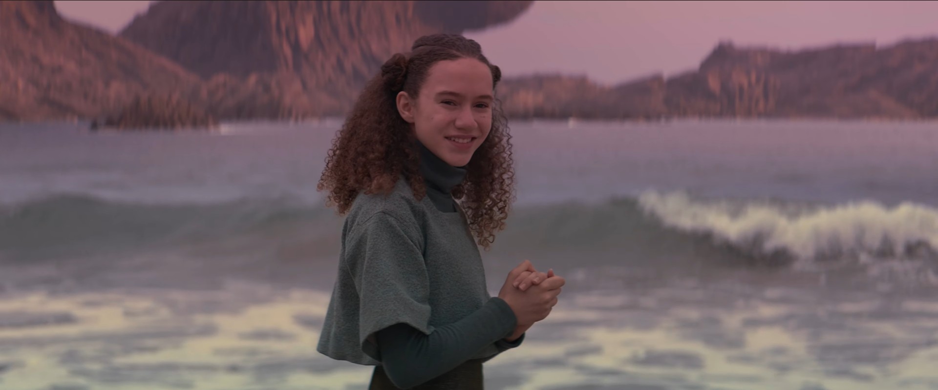 Daughter on beach and ocean view