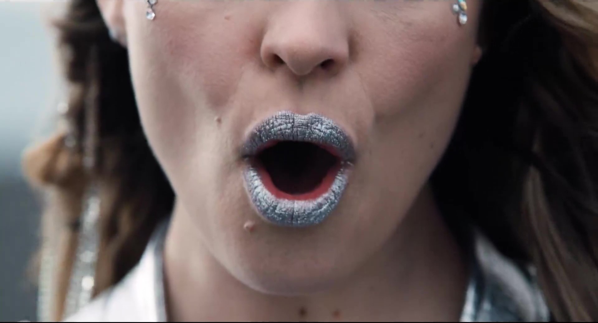 Woman with glossy lips that can be similar to crack addicts