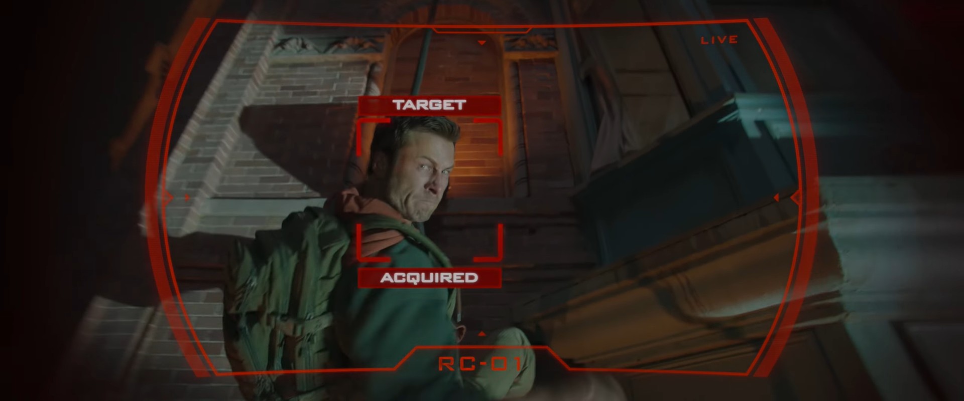 The Running Man on the side of a building, target acquired