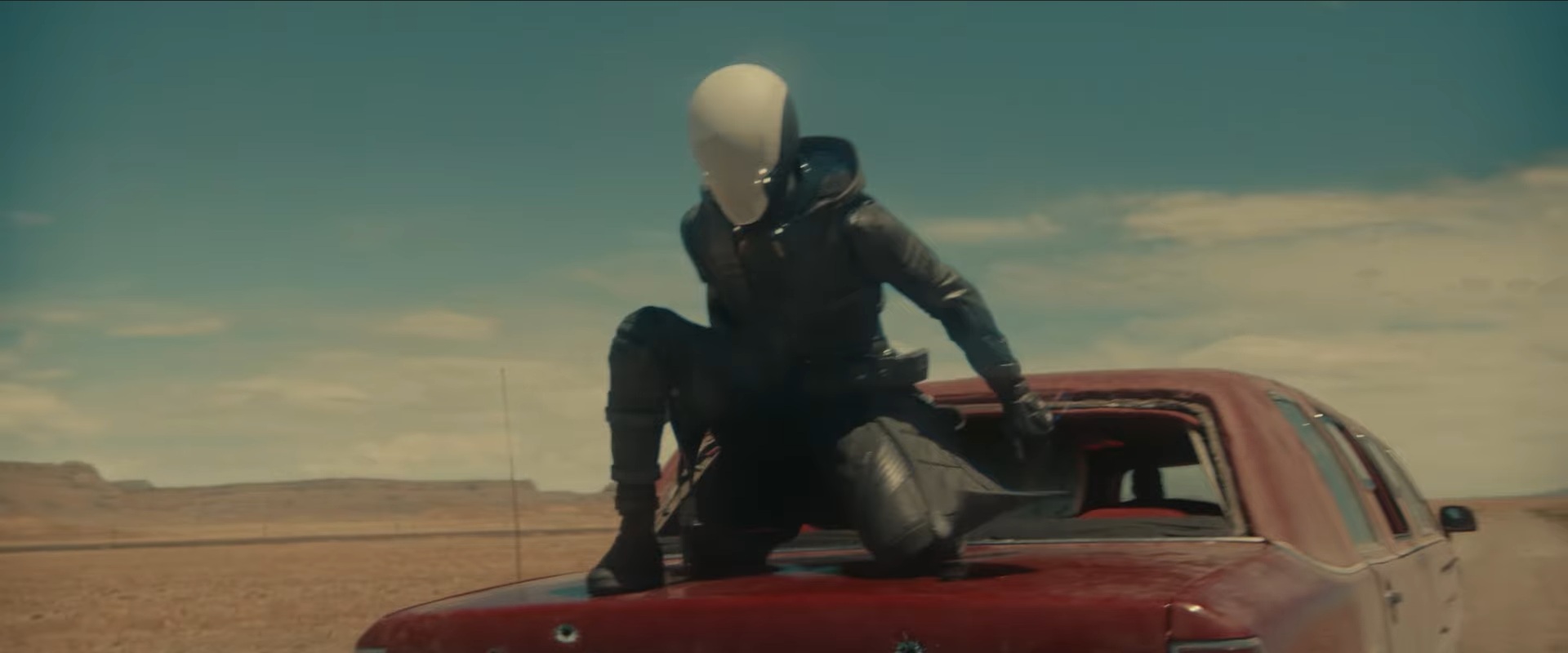 Ghost on the trunk of Red Guardian limousine